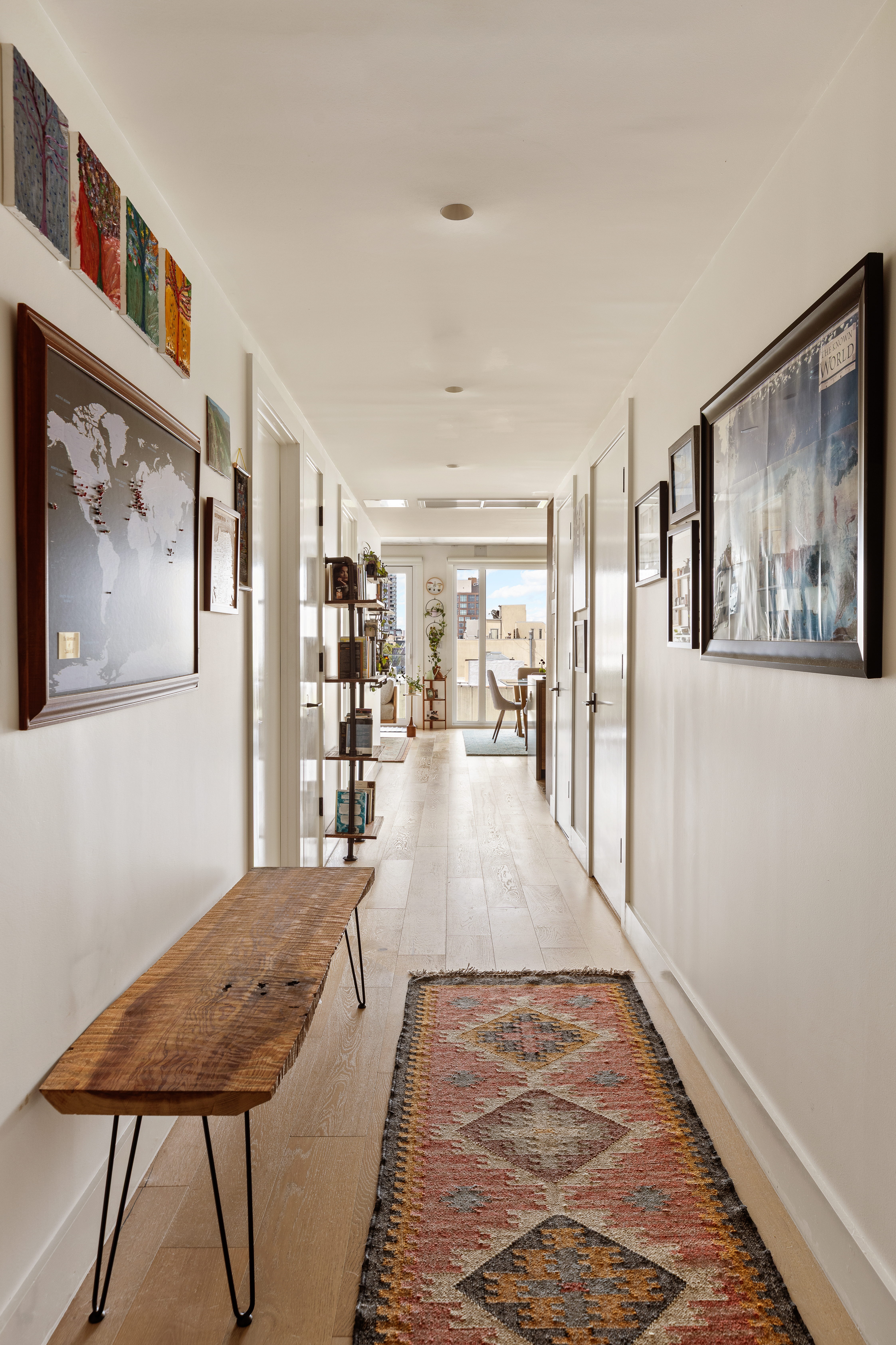 169 Huron Street, Unit PHB Brooklyn, NY 11222 - Photo 5 of 12 a view of a living room and kitchen with furniture