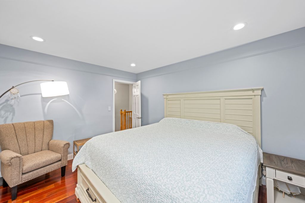 79 Sparkill Avenue Staten Island, NY 10304 - Photo 19 of 32 a bedroom with a bed and a couch