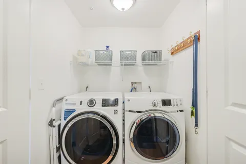 a view of washer and dryer in a utility room