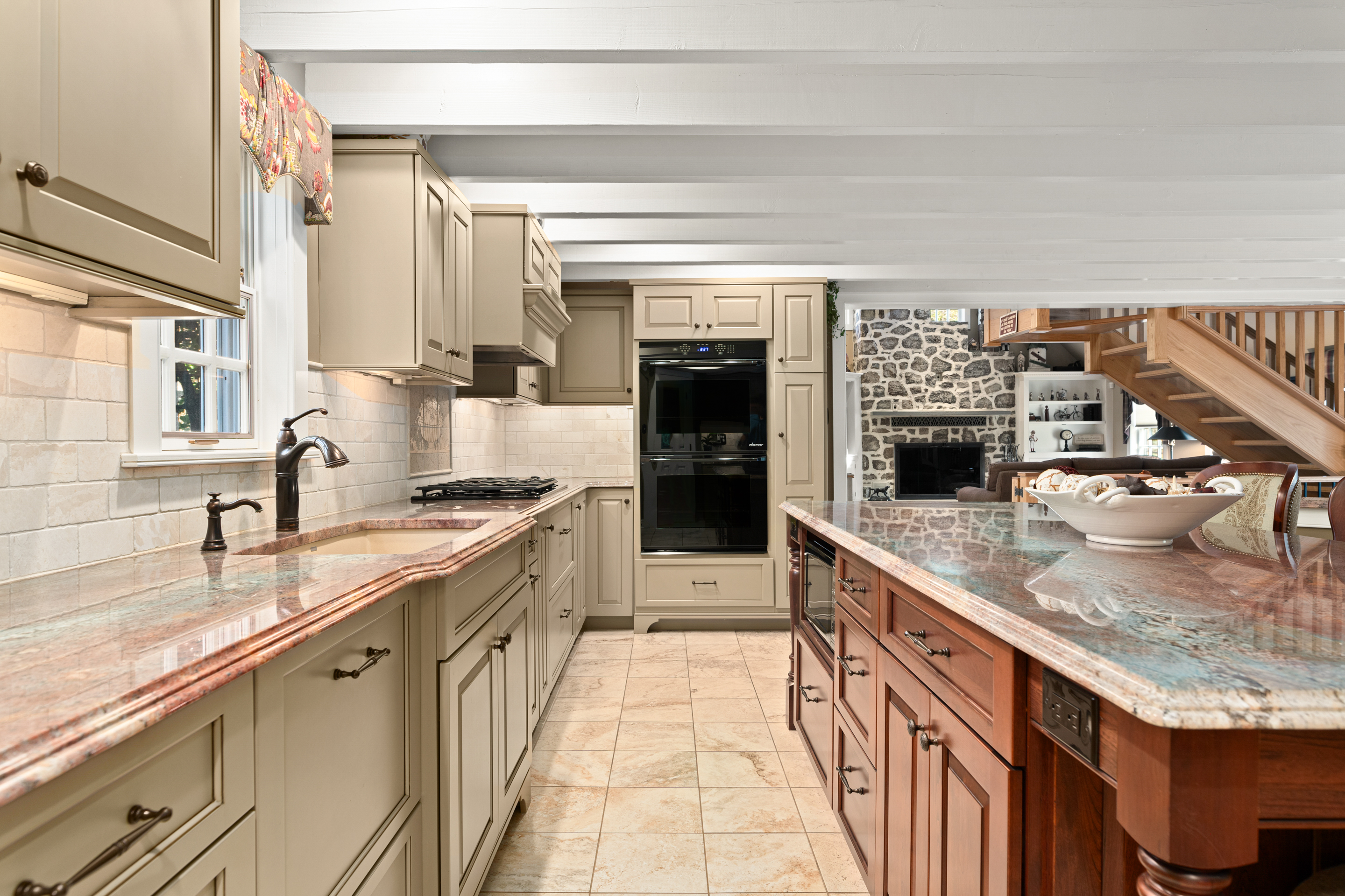 791 Grubbs Mill Road Berwyn, PA 19312 - Photo 11 of 76 a large kitchen with stainless steel appliances granite countertop a large counter top a stove and a sink