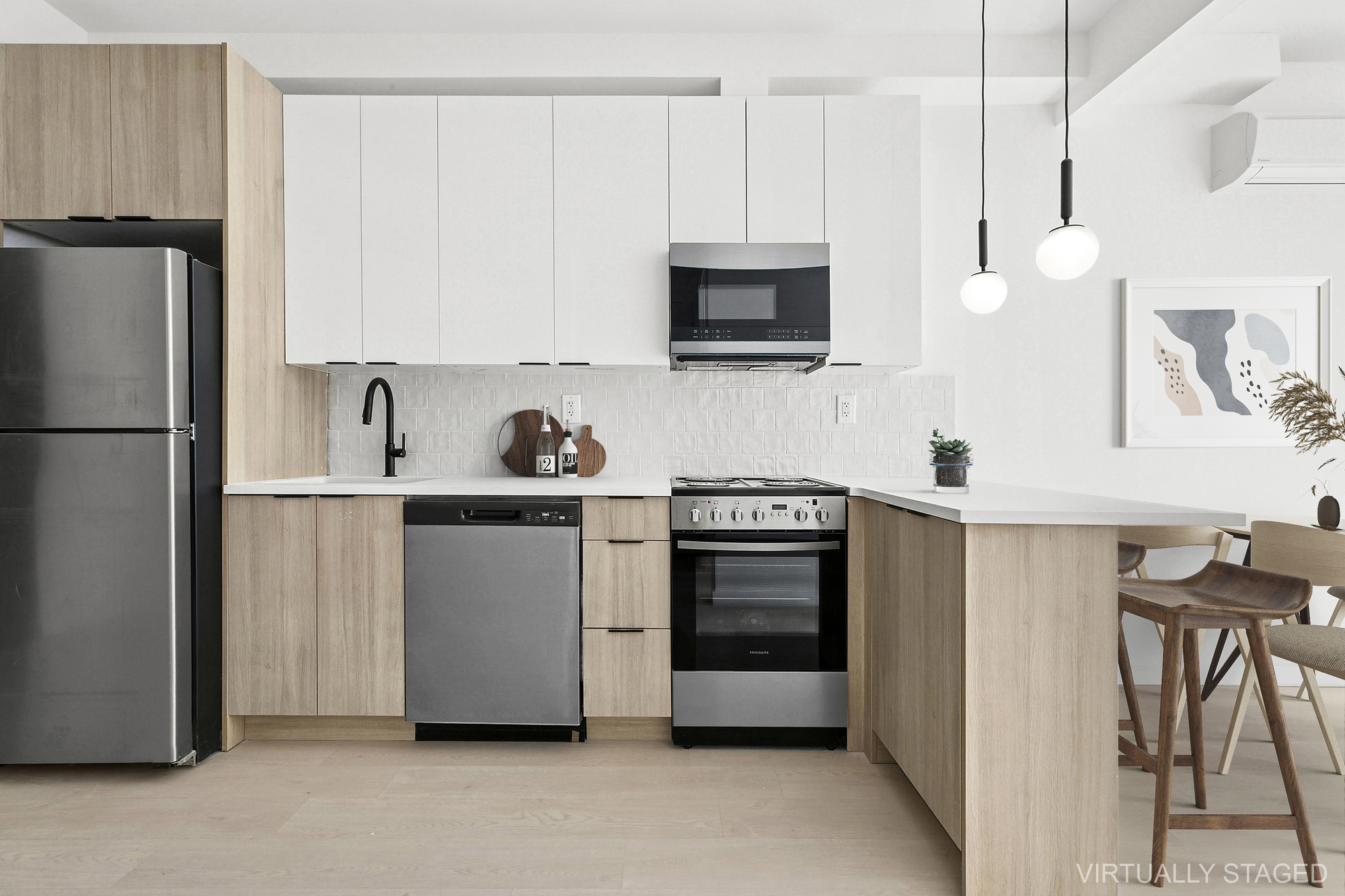 647 Dekalb Avenue, Unit 3A Brooklyn, NY 11216 - Photo 2 of 7 a kitchen with stainless steel appliances a refrigerator sink and microwave