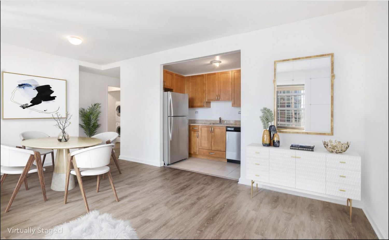 35 West 33rd Street, Unit 28D Manhattan, NY 10001 - Photo 2 of 28 a living room with furniture and a wooden floor