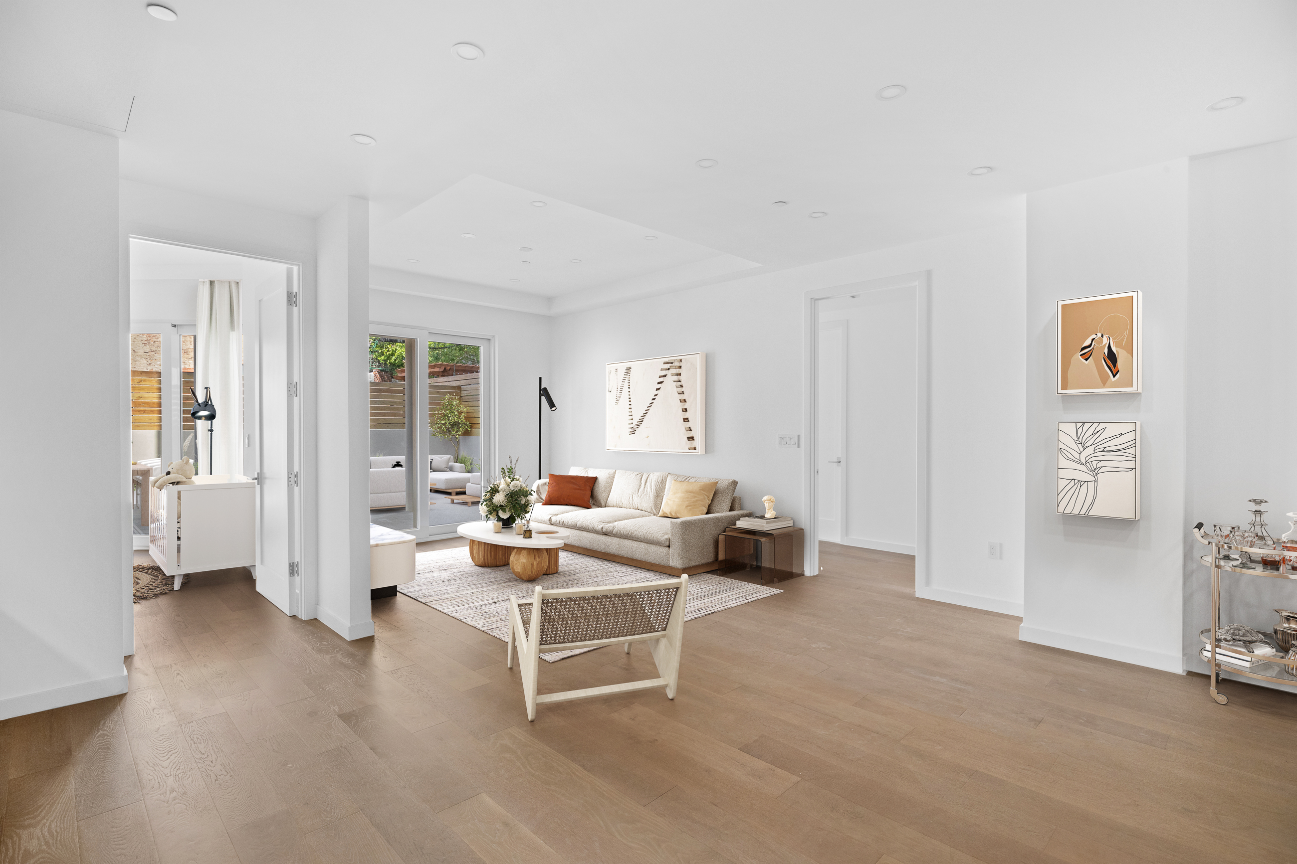 249 18th Street, Unit 1 Brooklyn, NY 11215 - Photo 10 of 12 a living room with furniture and a wooden floor