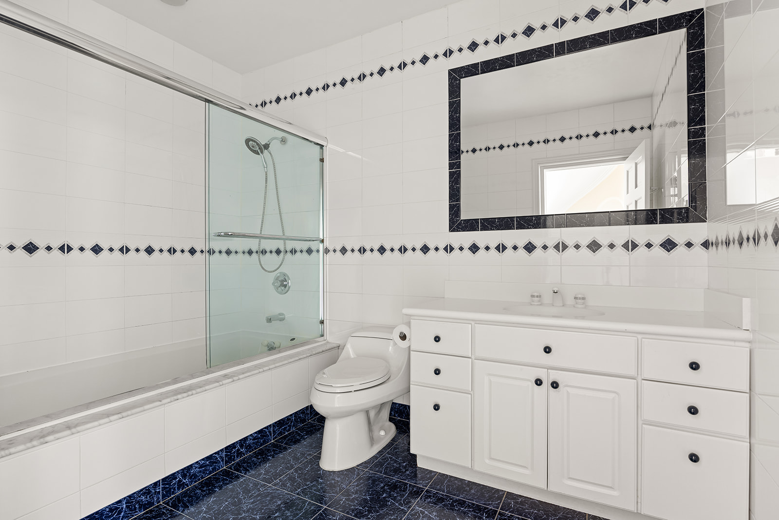 50 Wyckoff Street, Unit 2 Brooklyn, NY 11201 - Photo 9 of 14 a bathroom with a bathtub shower sink vanity and toilet