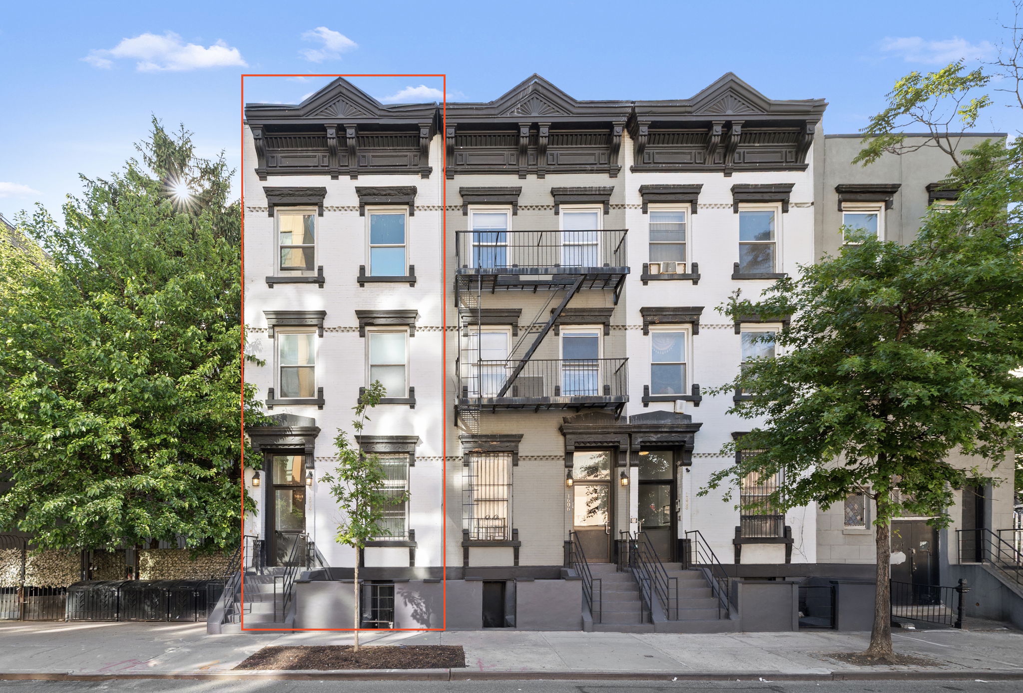 a front view of a building with street view