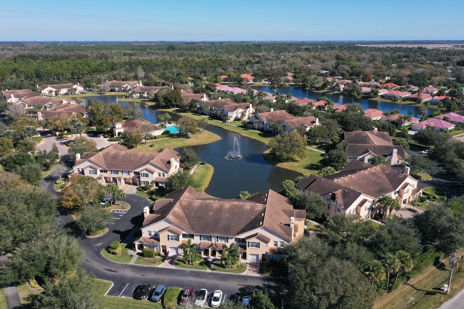 an aerial view of a house with outdoor space