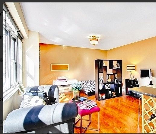 100 West 93rd Street, Unit 6E Manhattan, NY 10025 - Photo 2 of 7 a view of a dining room with furniture and a window