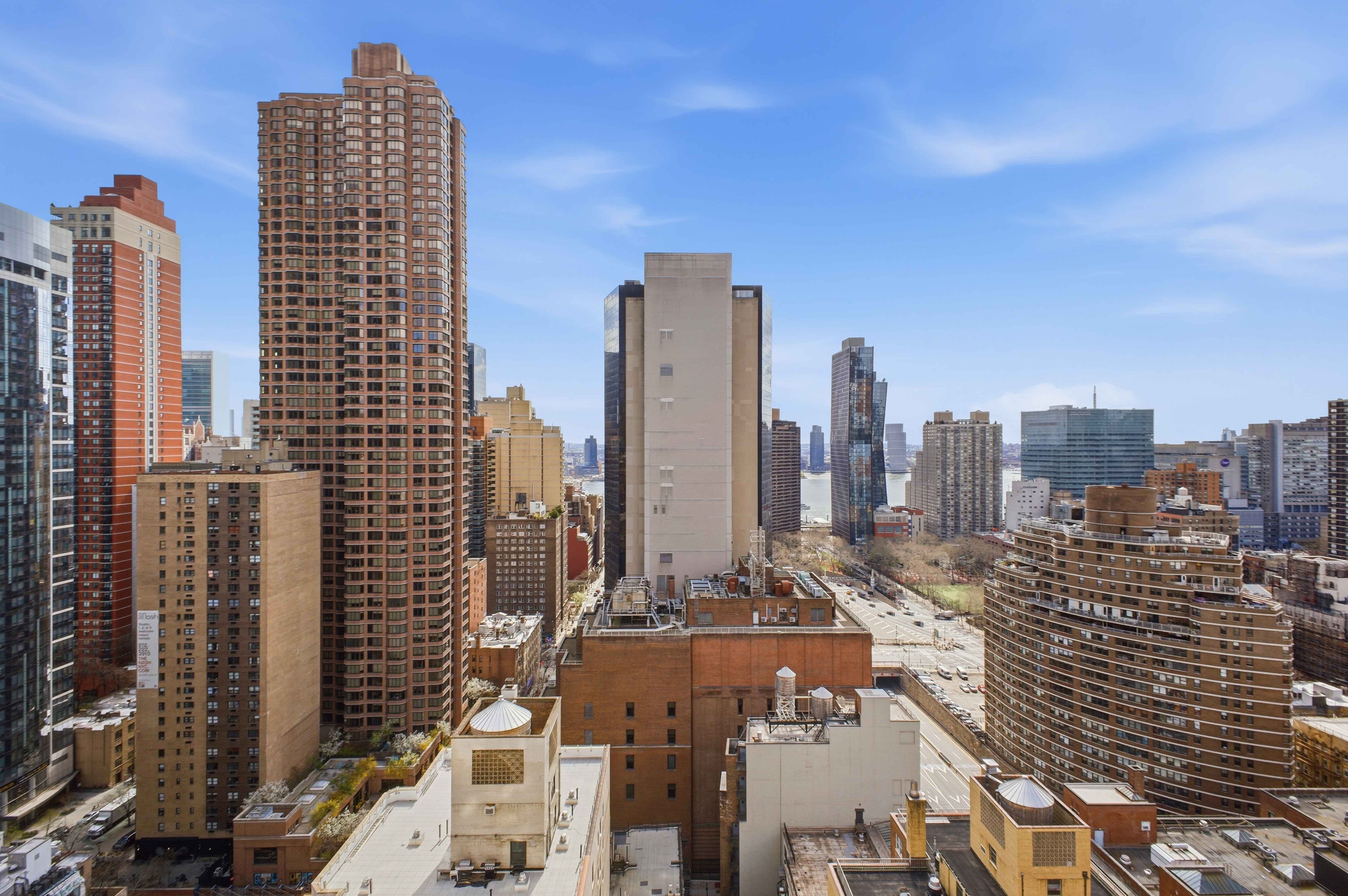 160 East 38th Street, Unit 26FG Manhattan, NY 10016 - Photo 21 of 23 a city view with tall buildings