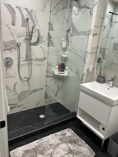 a bathroom with a sink and vanity