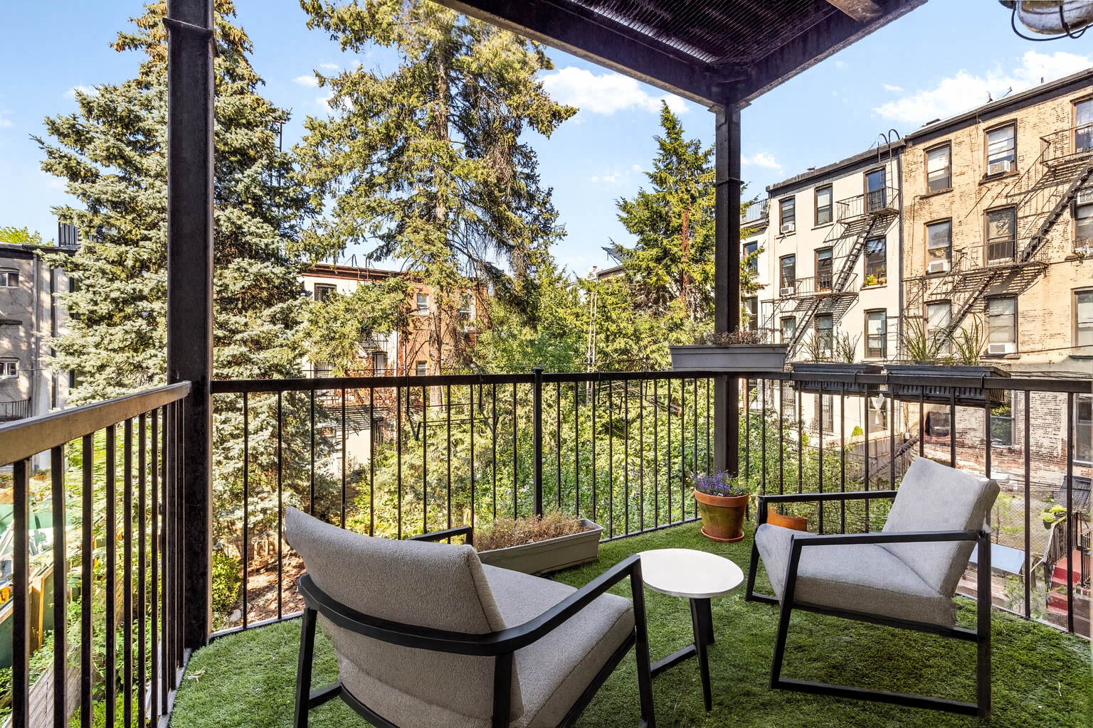 667 Carroll Street, Unit 2 Brooklyn, NY 11215 - Photo 2 of 7 a view of a chairs and table in patio