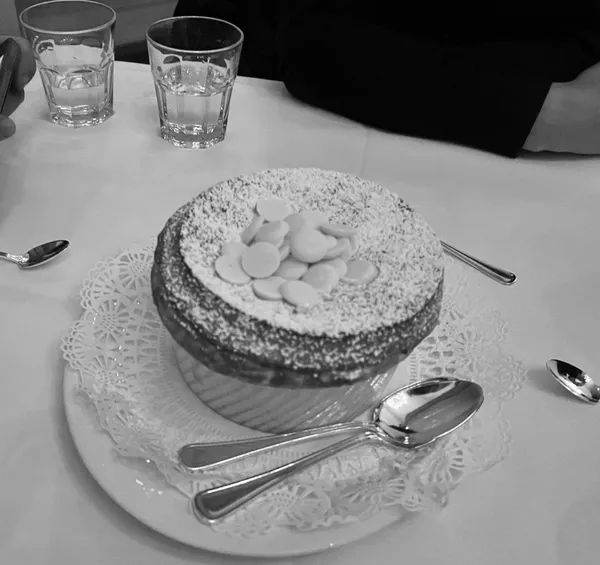 a bathroom with a mirror and vanity