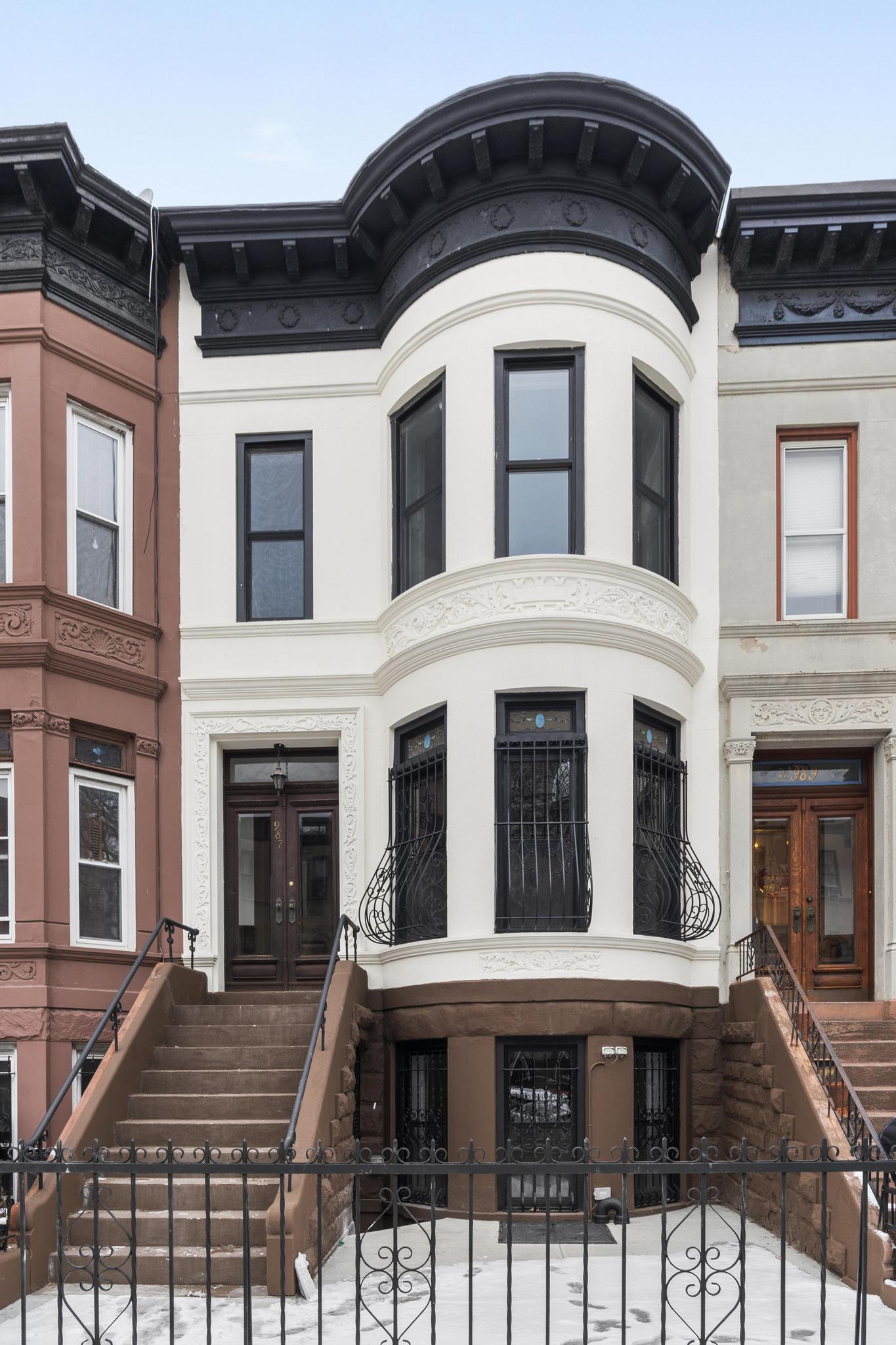 987 Sterling Place Brooklyn, NY 11213 - Photo 14 of 16 a large brick building with a window