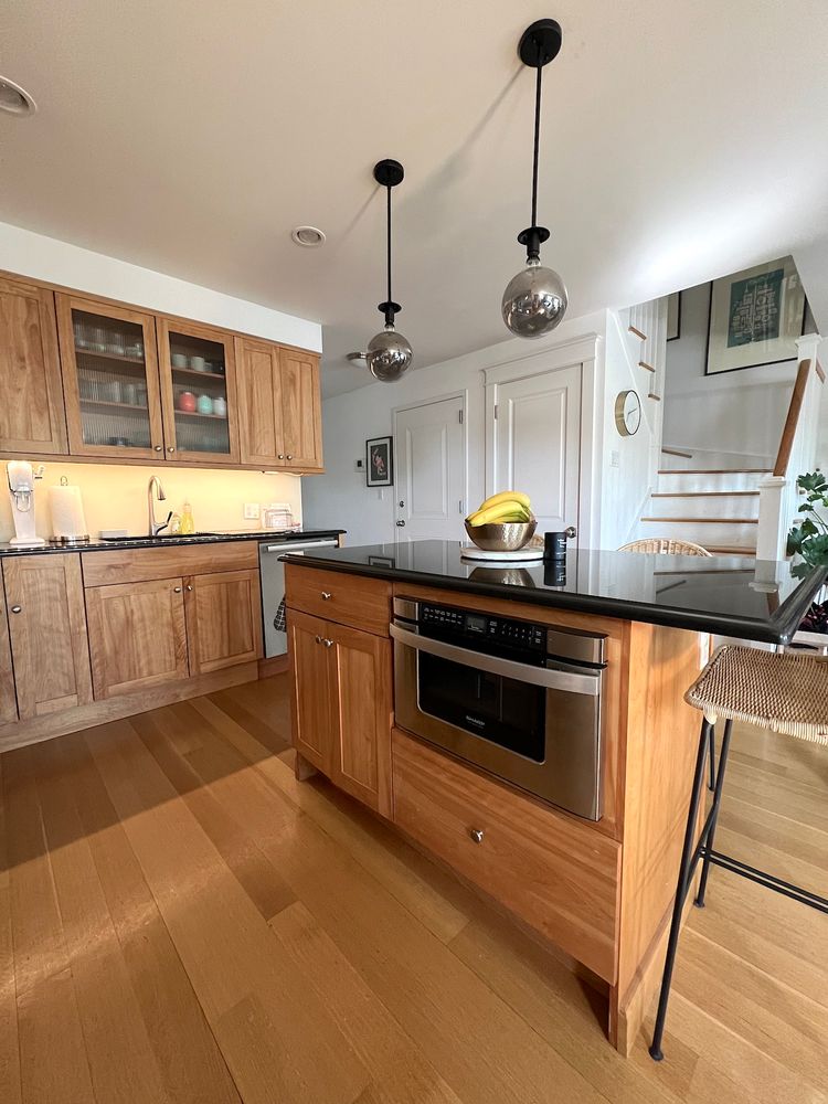 148 Luquer Street, Unit 2 Brooklyn, NY 11231 - Photo 6 of 22 a kitchen with stainless steel appliances granite countertop a sink a stove and a wooden floors