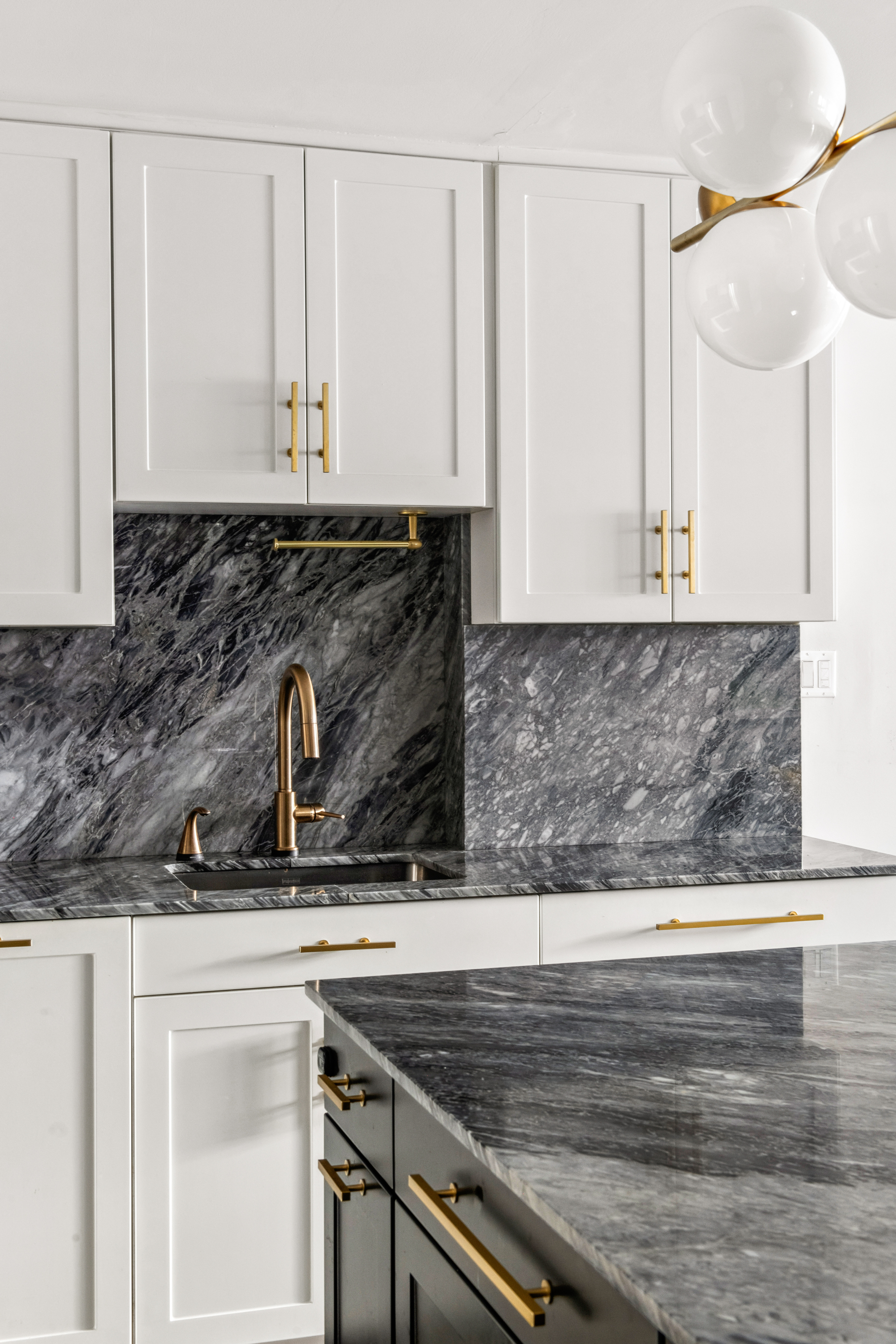 340 East 80th Street, Unit 1D Manhattan, NY 10075 - Photo 3 of 15 a kitchen with a sink and cabinets
