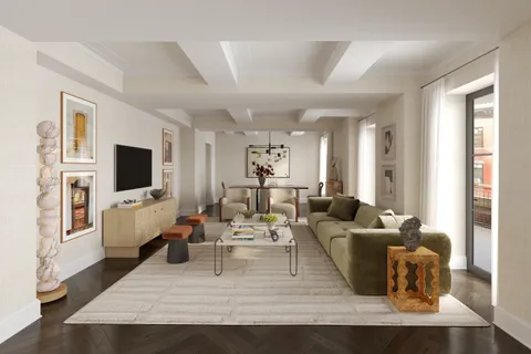 a living room with furniture wooden floor and a flat screen tv