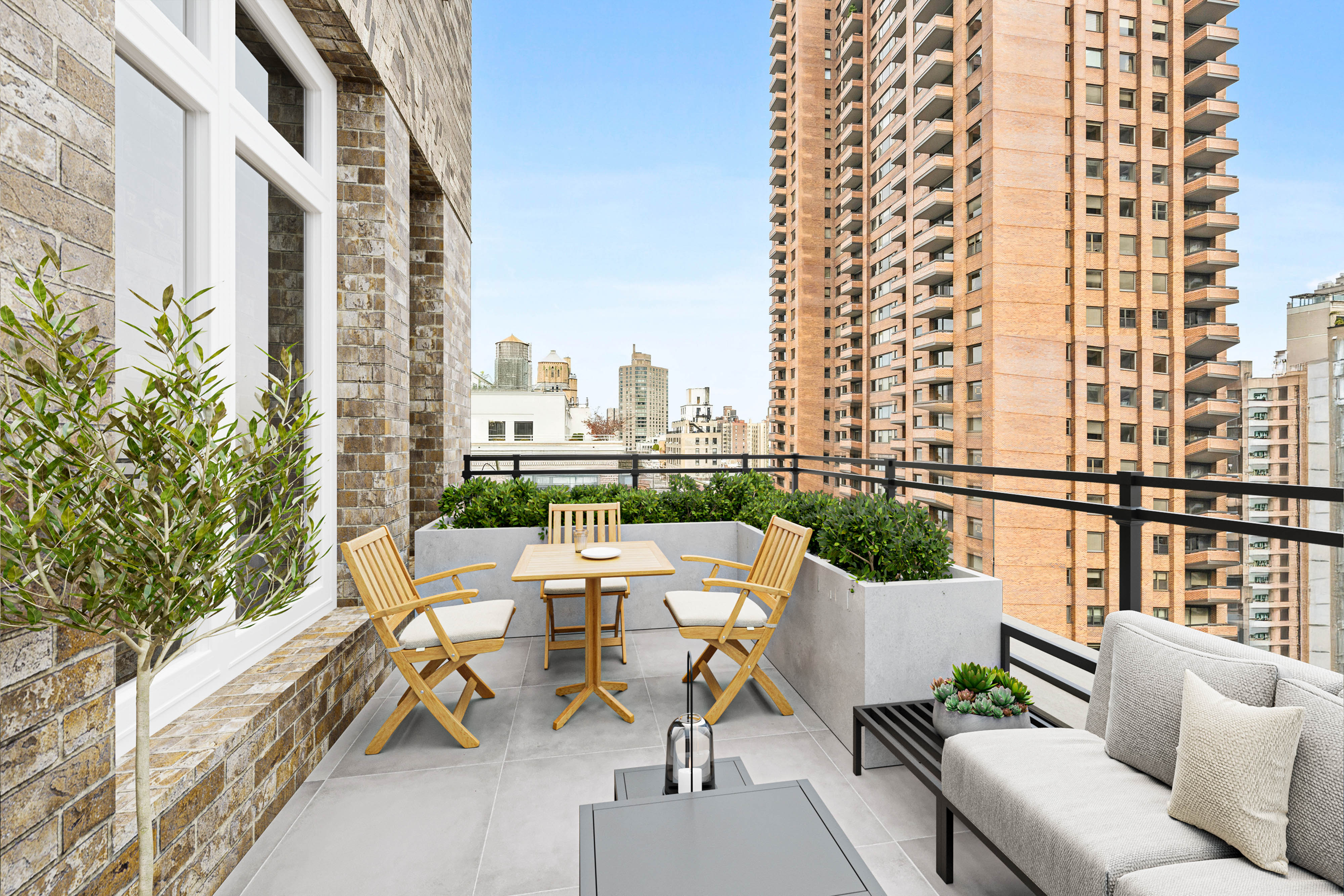 1228 Madison Avenue, Unit 11 Manhattan, NY 10128 - Photo 16 of 22 a view of balcony with furniture and potted plants