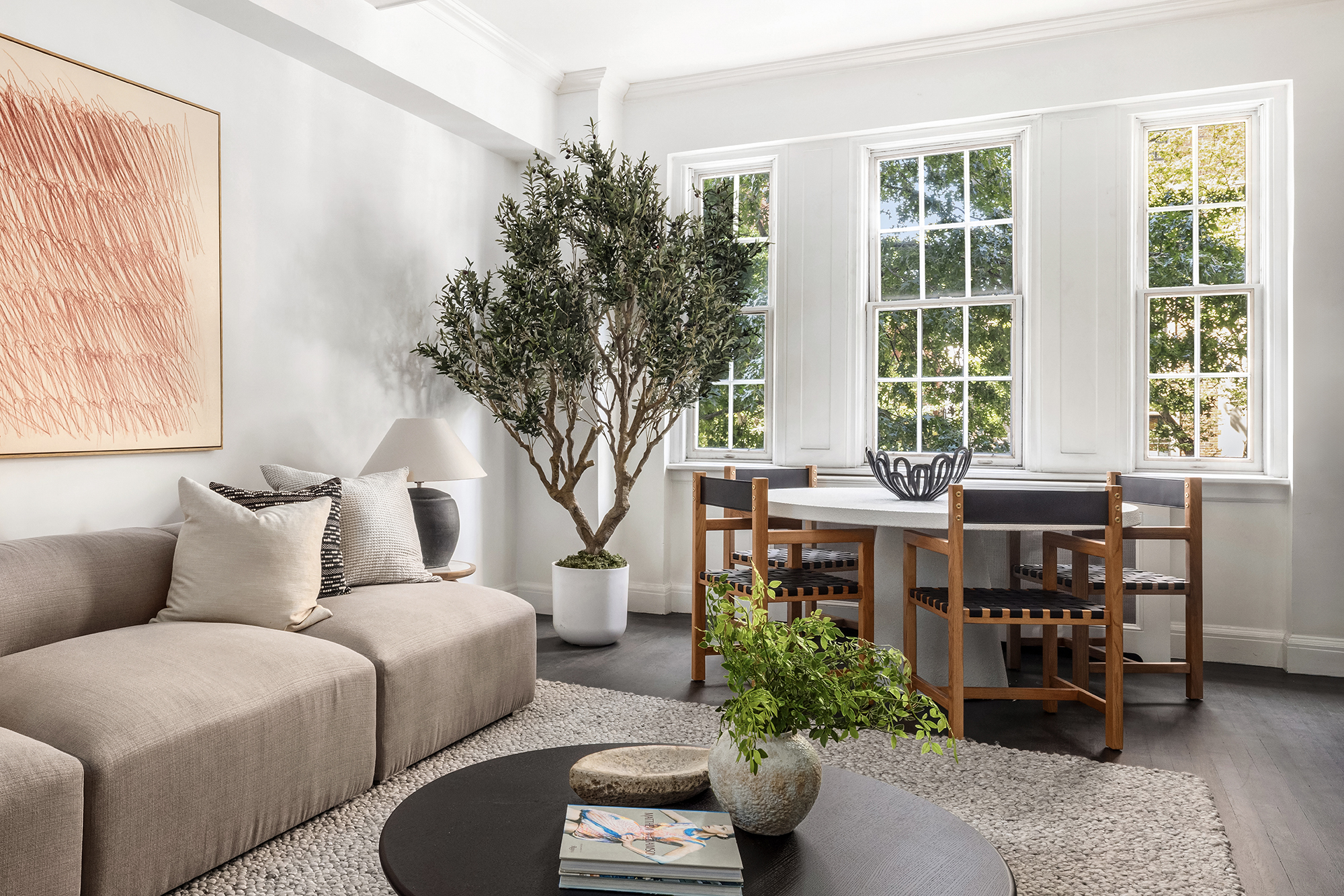 39 5th Avenue, Unit 2B Manhattan, NY 10003 - Photo 4 of 12 a living room with furniture and a potted plant