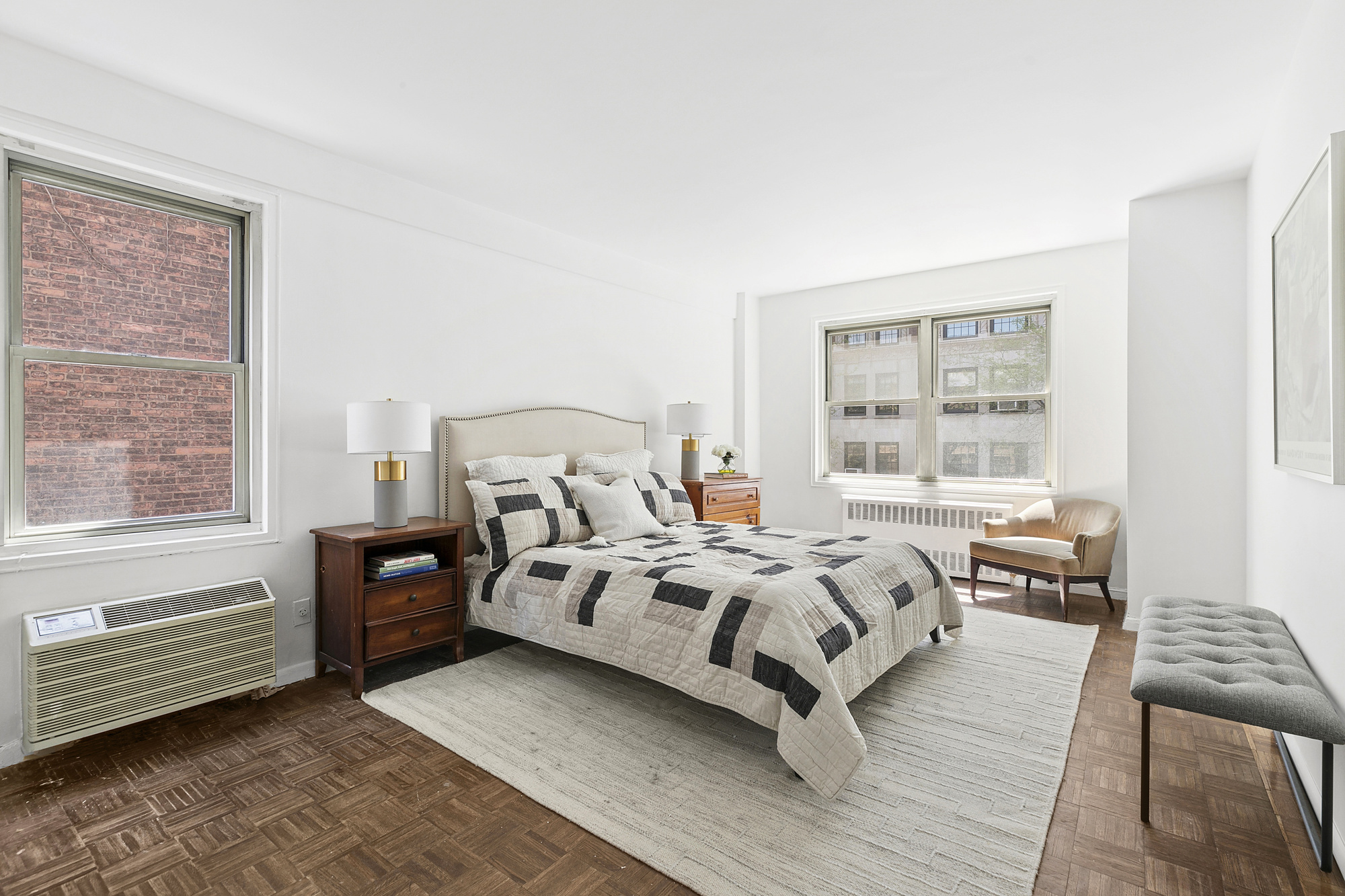 1199 Park Avenue, Unit 2F Manhattan, NY 10128 - Photo 6 of 12 a bed room with a bed and a chair