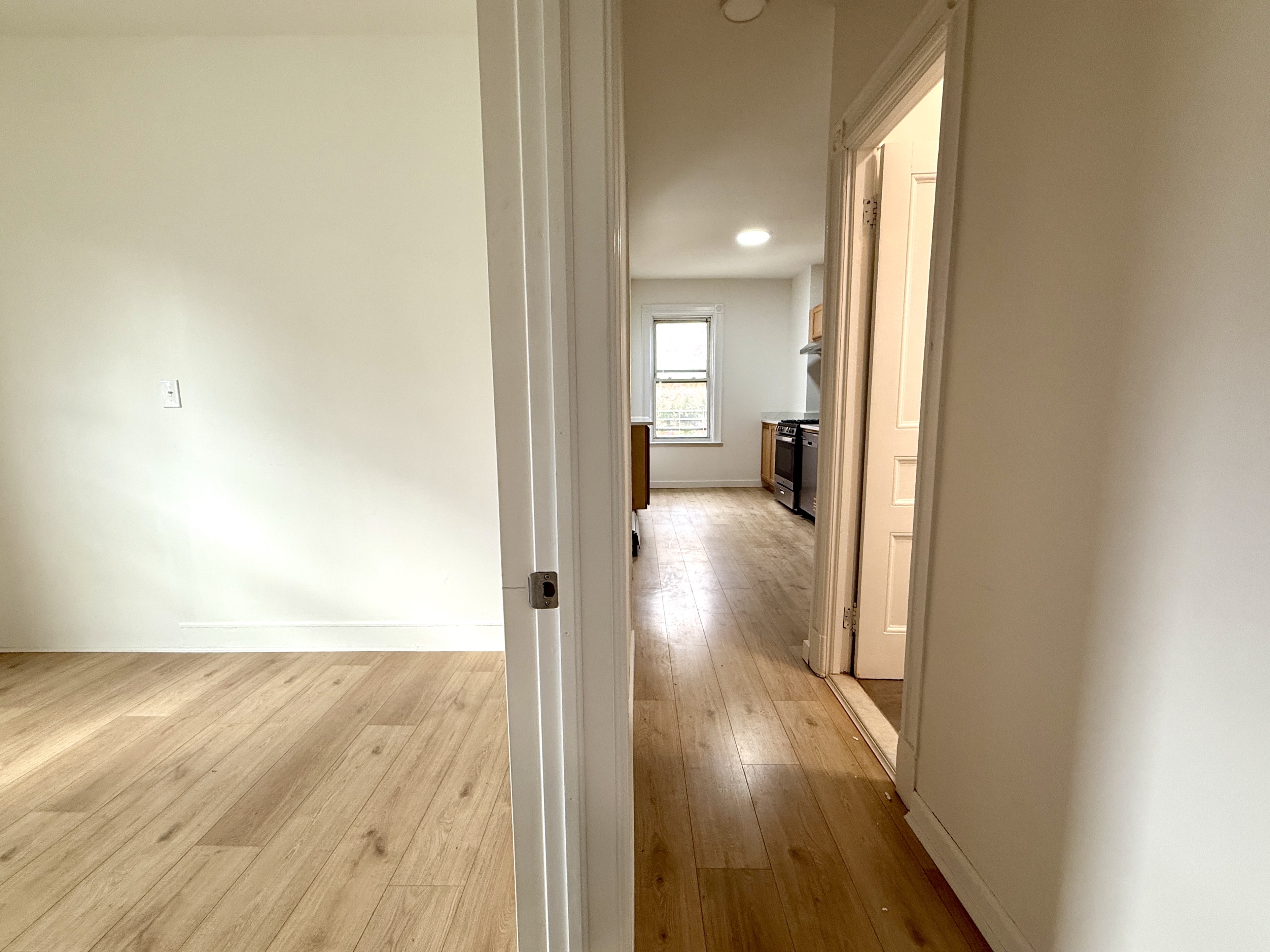 31 Seeley Street, Unit Undisclosed Brooklyn, NY 11218 - Photo 16 of 31 a view of a hallway with wooden floor
