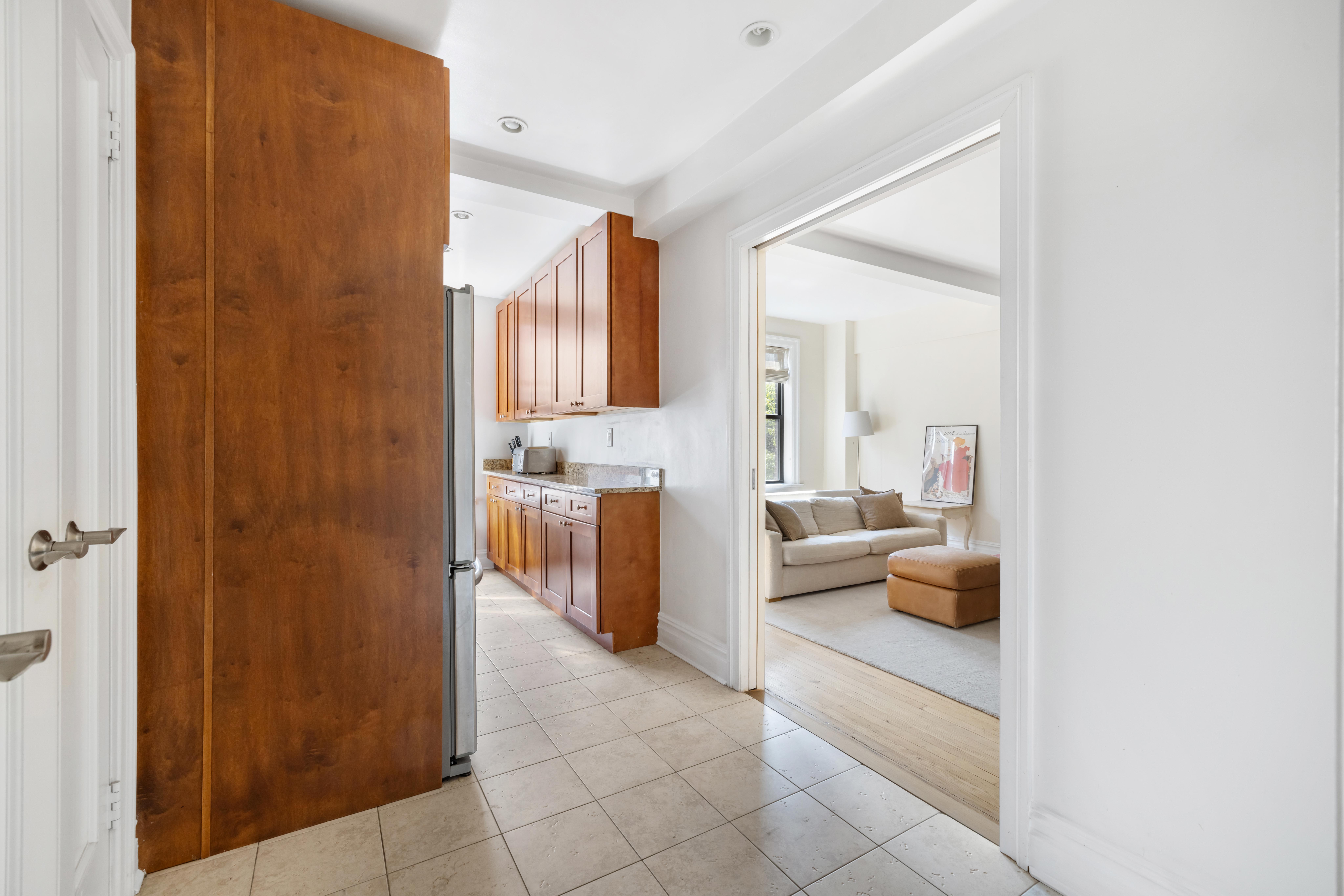 444 Central Park West, Unit 5E Manhattan, NY 10025 - Photo 5 of 14 a en suite bathroom with a sink a mirror and a shower