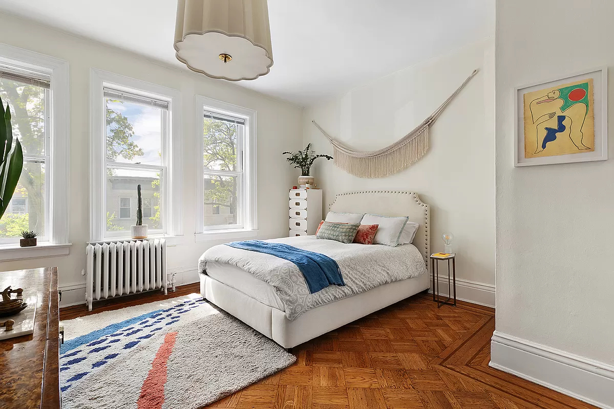 207 Windsor Place Brooklyn, NY 11215 - Photo 9 of 20 a bedroom with a bed and a window