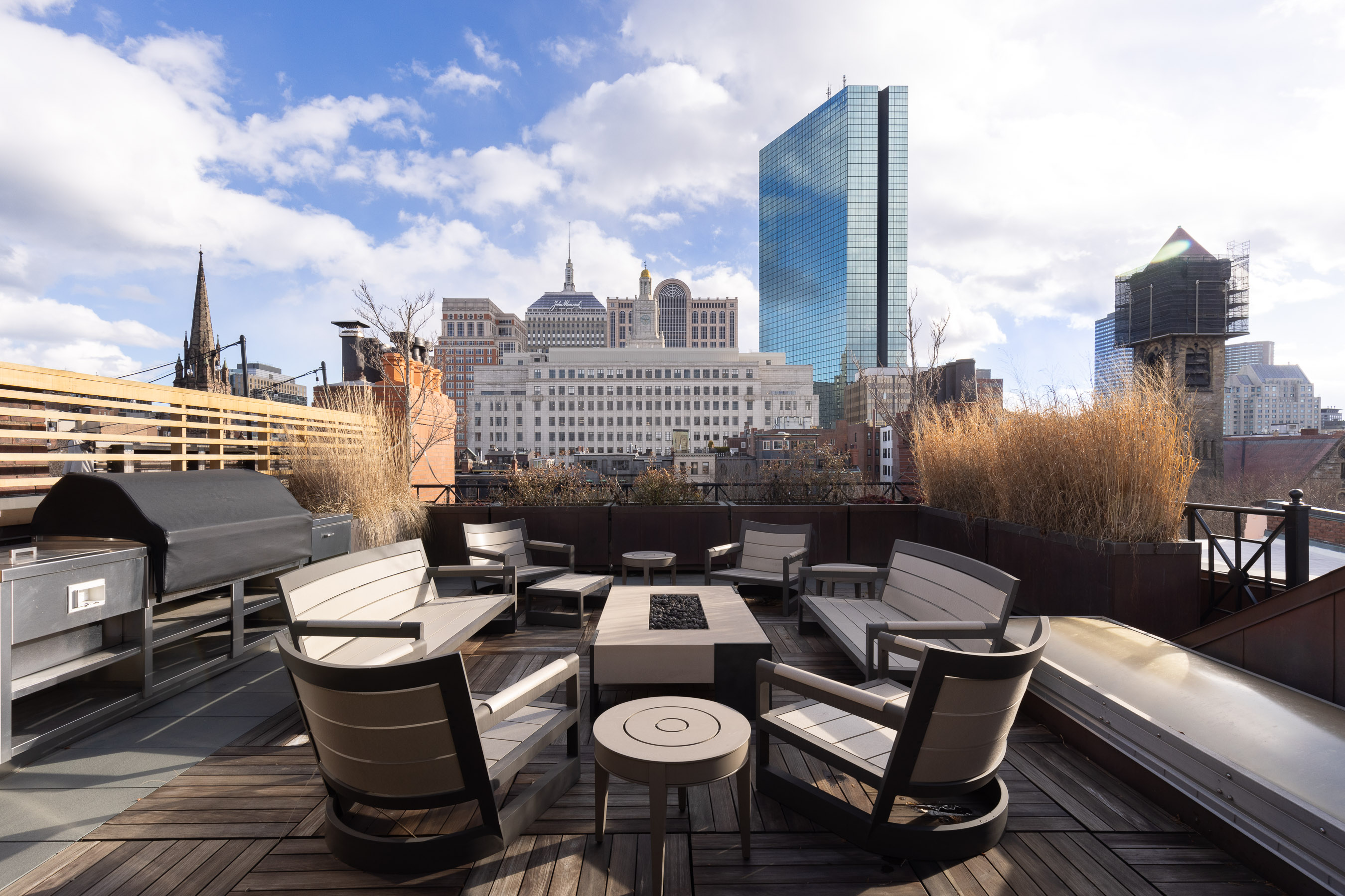 55 Commonwealth Avenue Boston, MA 02116 - Photo 13 of 13 a view of a terrace with furniture and stove