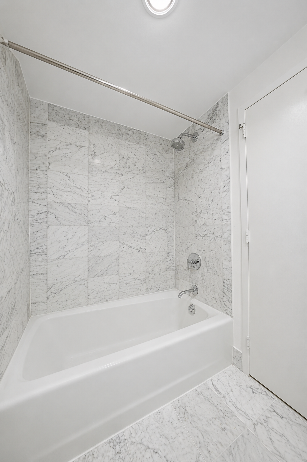 257 West 117th Street, Unit 2F Manhattan, NY 10026 - Photo 15 of 21 a bathroom with a shower and a bath tub
