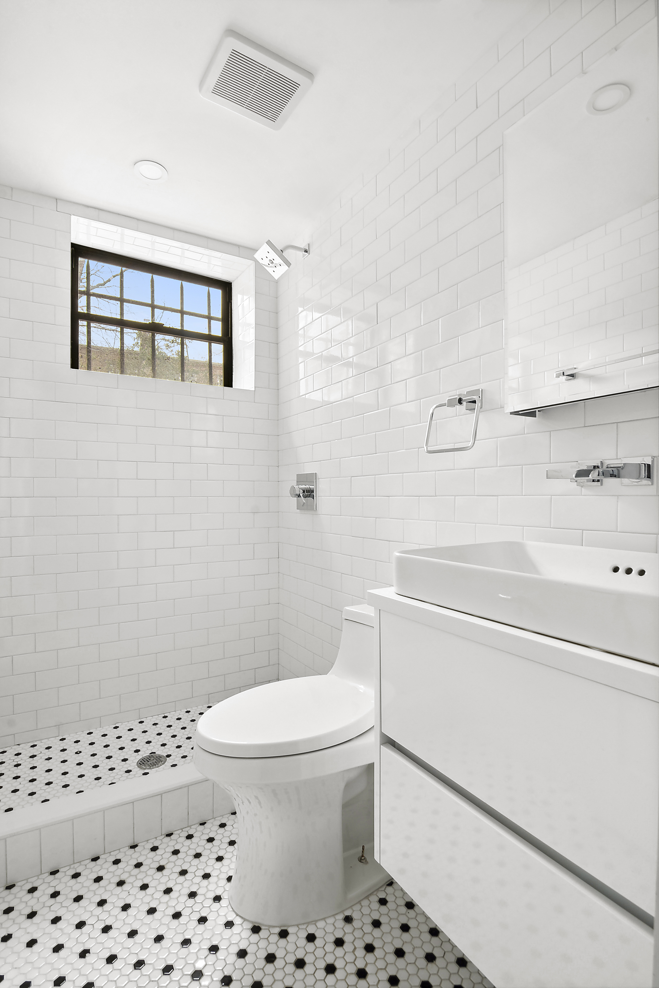 195 Rutland Road Brooklyn, NY 11225 - Photo 18 of 21 a bathroom with a toilet a sink and a shower