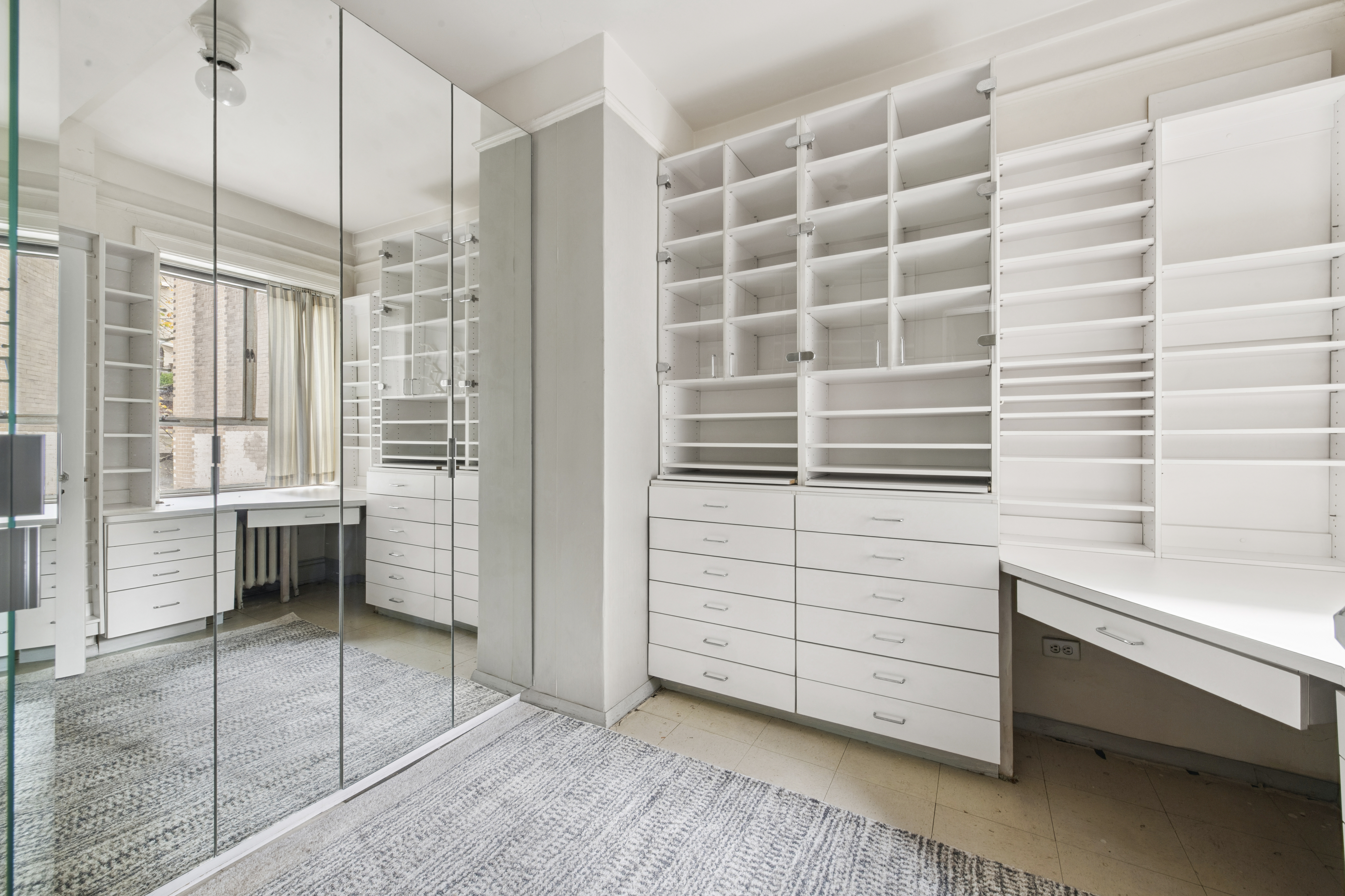 1 West 67th Street, Unit 303-304 Manhattan, NY 10023 - Photo 10 of 18 a view of walk in closet and bedroom view