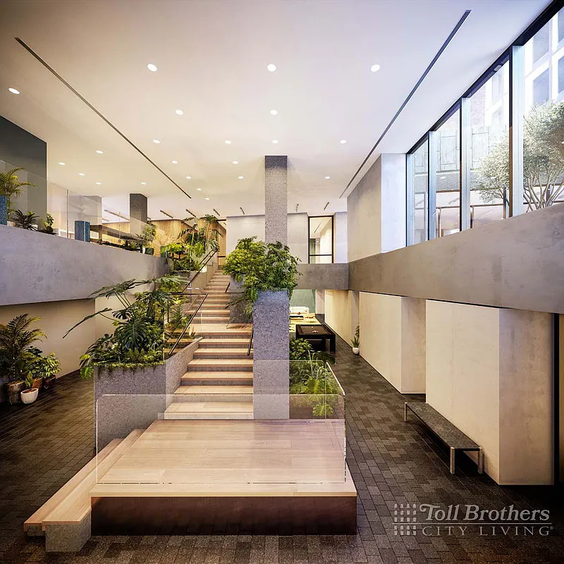 77 Charlton Street, Unit S10A Manhattan, NY 10014 - Photo 18 of 27 a lobby with furniture and a potted plant
