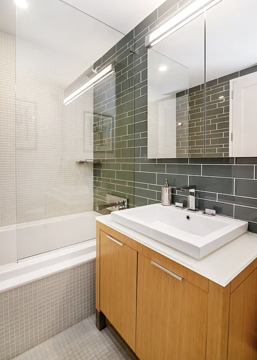34 North 7th Street, Unit 6Y Brooklyn, NY 11249 - Photo 6 of 20 a bathroom with a sink and a bathtub