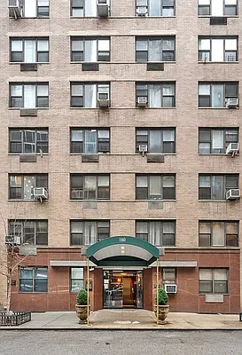 150 East 56th Street, Unit 2A Manhattan, NY 10022 - Photo 8 of 10 a front view of a building with windows