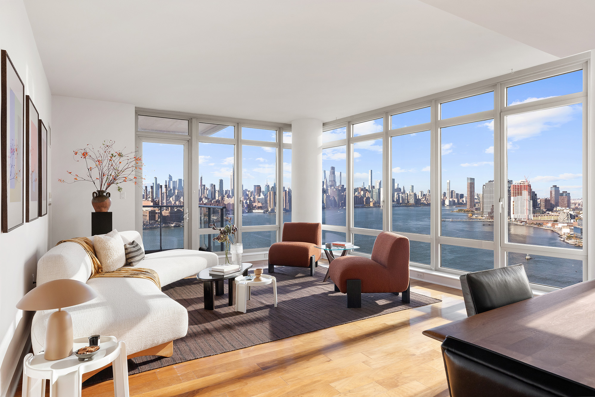 2 Northside Piers, Unit 25P Brooklyn, NY 11249 - Photo 2 of 26 a living room with furniture and a large window