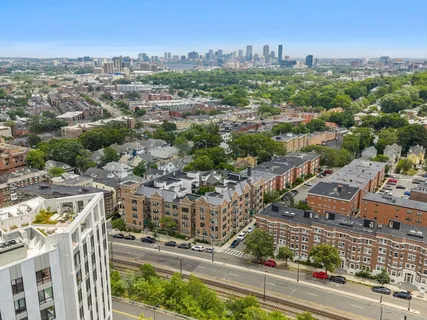 an aerial view of a city with lots of residential buildings