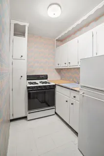 a building with furniture and a rug