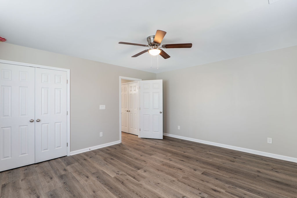 320 Adams Avenue Batesburg, SC 29006 - Photo 27 of 28 a view of empty room with wooden floor