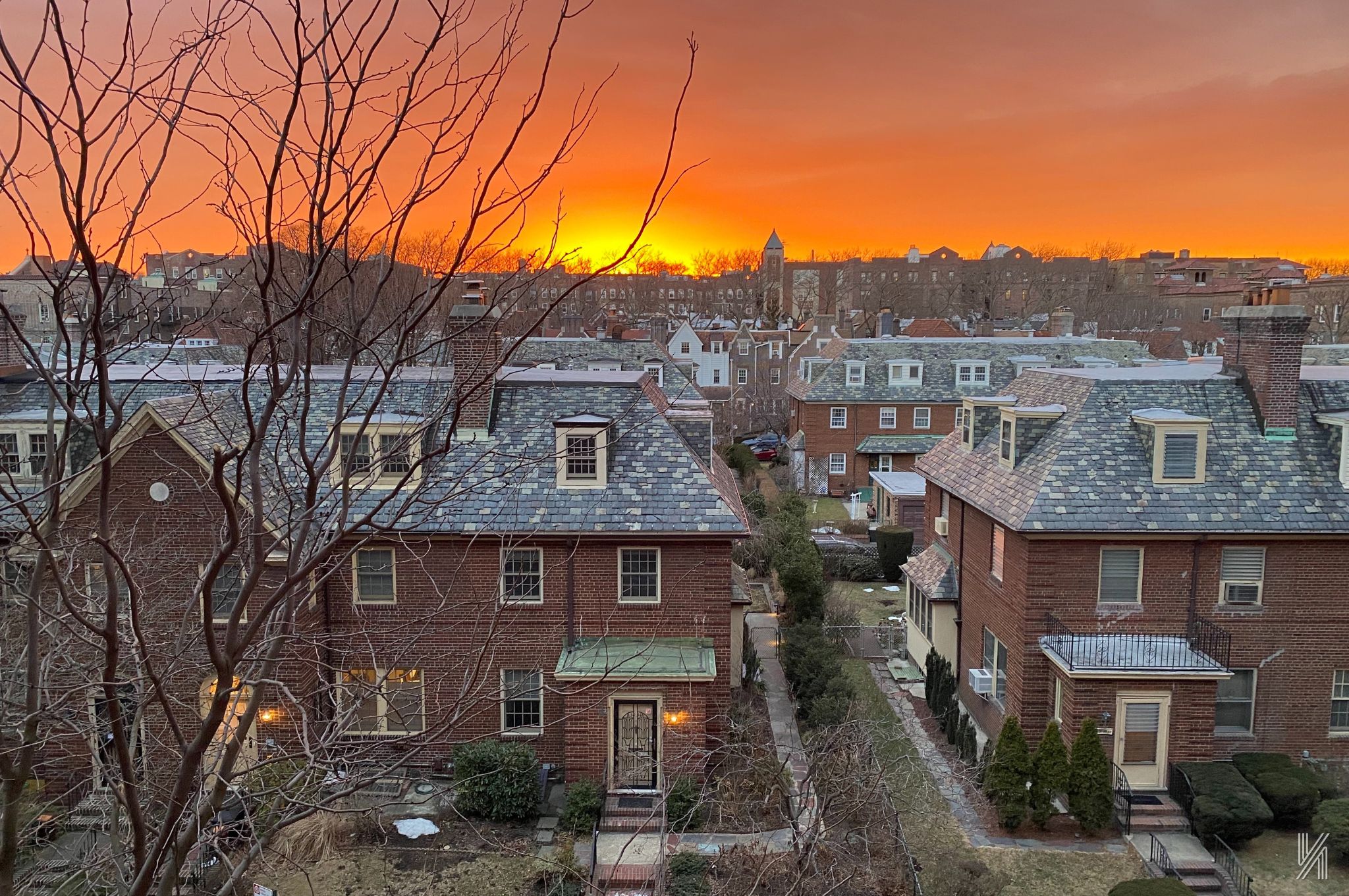 34-41 85th Street, Unit 4P Queens, NY 11372 - Photo 17 of 20 a front view of a house with a yard and mountain view