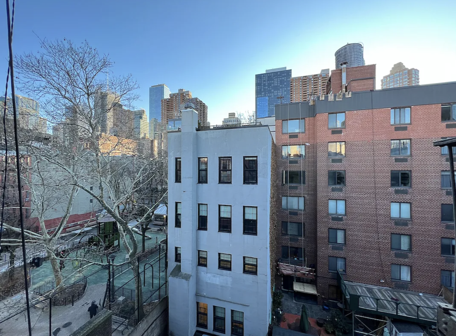 446 West 46th Street, Unit 12 Manhattan, NY 10036 - Photo 5 of 18 a view of city with tall buildings