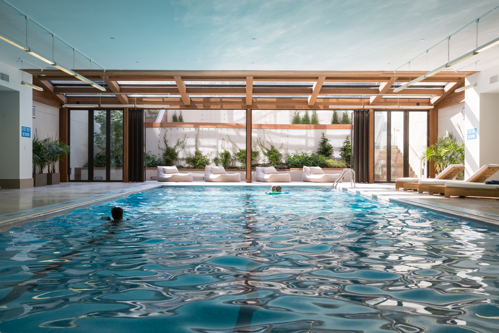 429 Kent Avenue, Unit 912 Brooklyn, NY 11249 - Photo 5 of 11 a view of swimming pool with outdoor seating