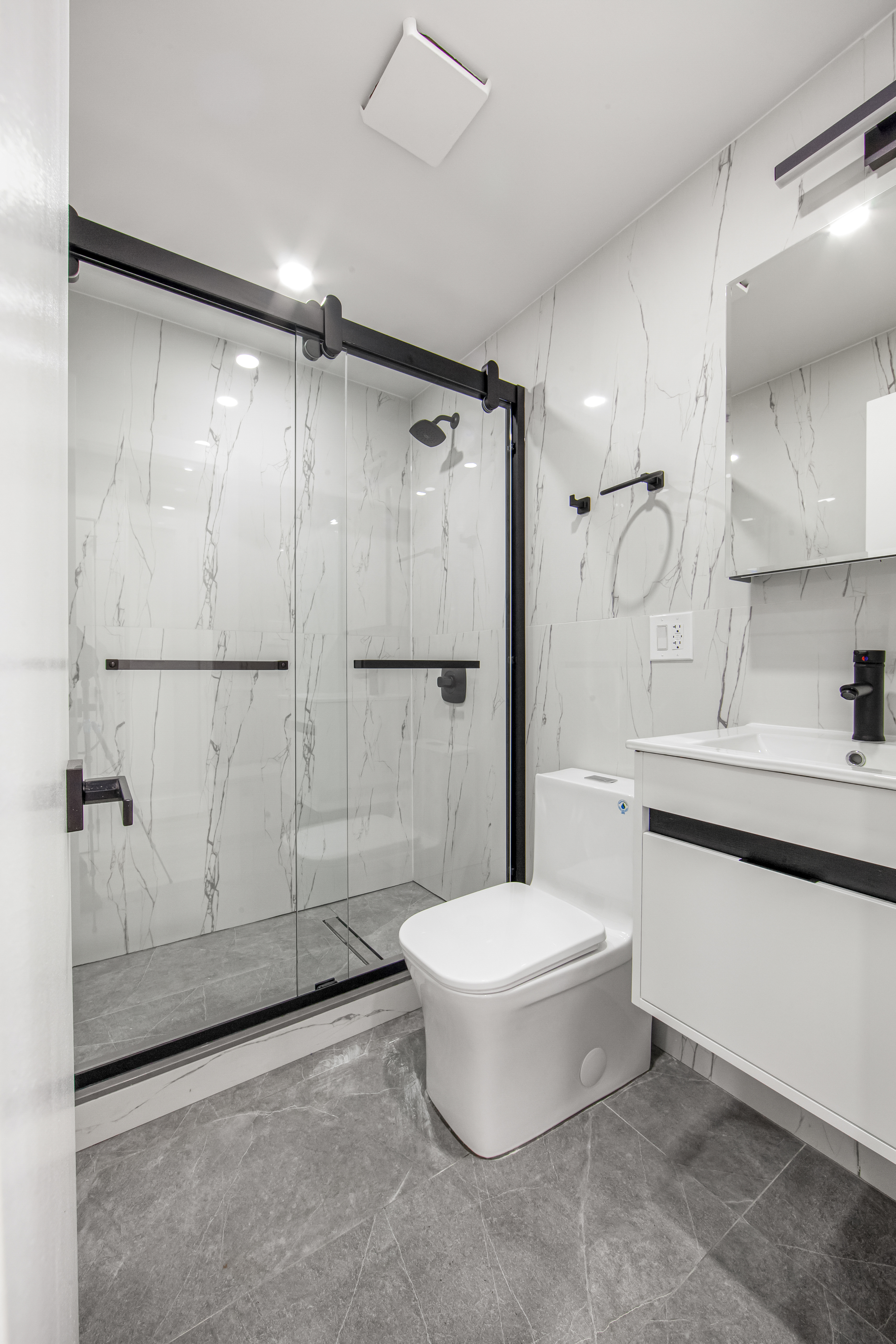 433 Court Street, Unit PH3 Brooklyn, NY 11231 - Photo 8 of 14 a bathroom with a tub toilet and shower