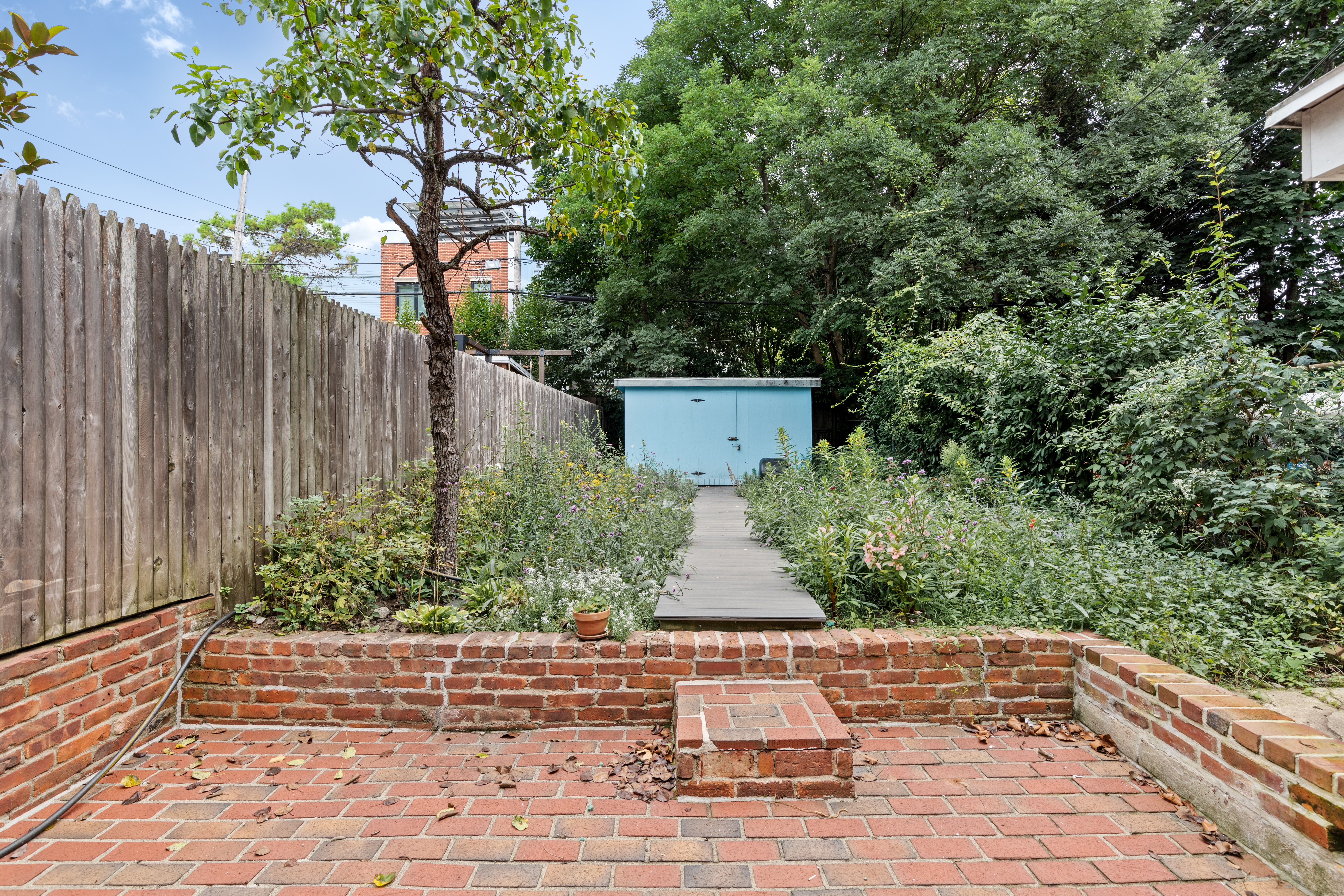 537 18th Street Brooklyn, NY 11215 - Photo 11 of 12 a view of a garden with pathway