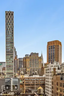 a view of city with tall buildings