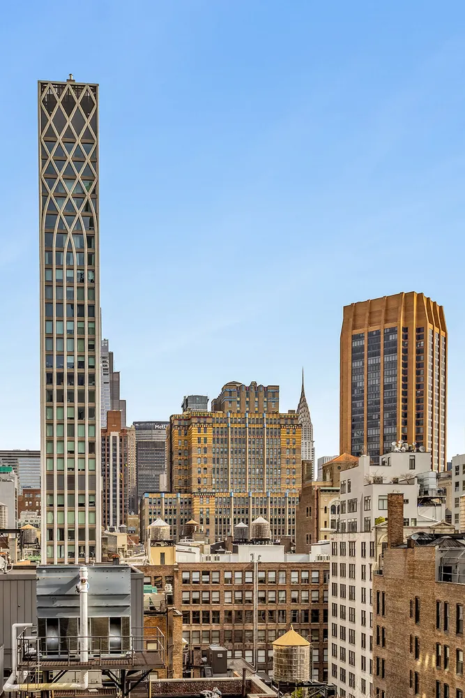a view of city with tall buildings