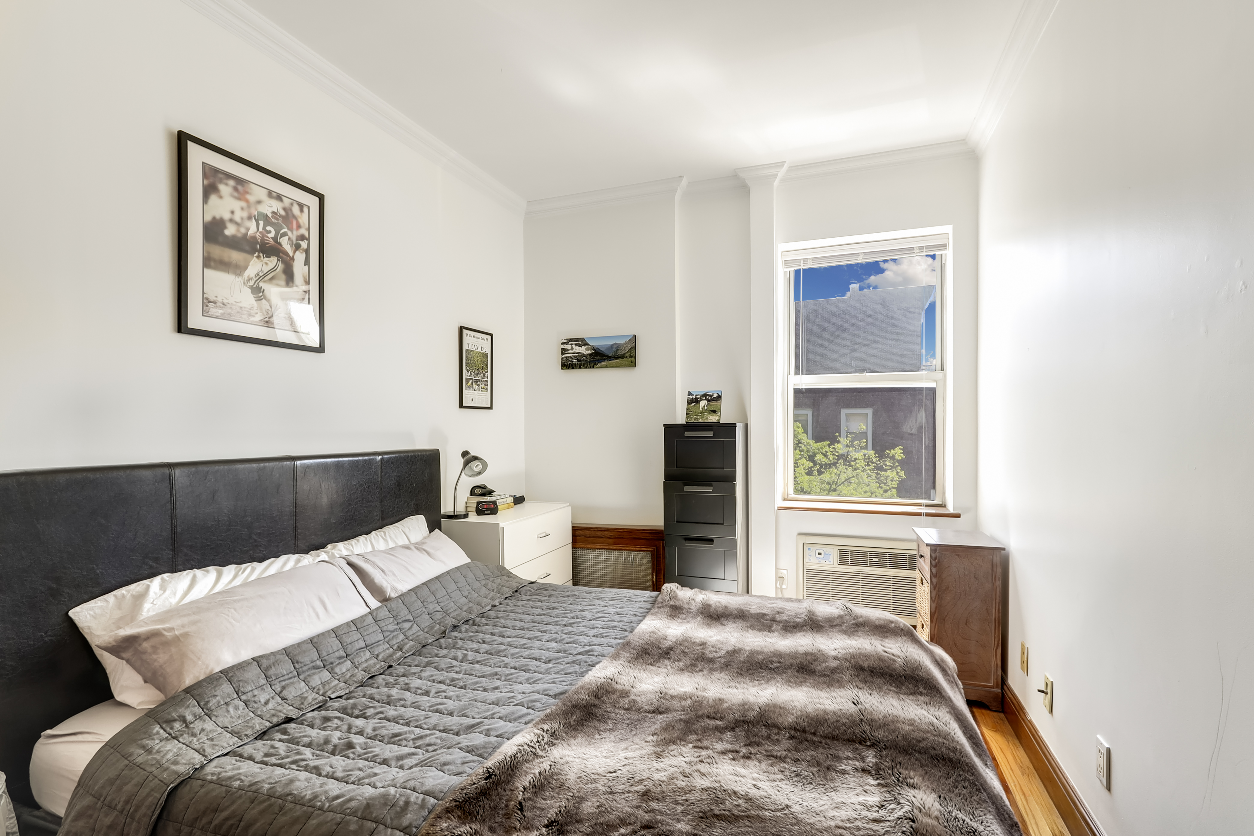 223 Smith Street, Unit 3F Brooklyn, NY 11201 - Photo 4 of 8 a bedroom with a bed and a window