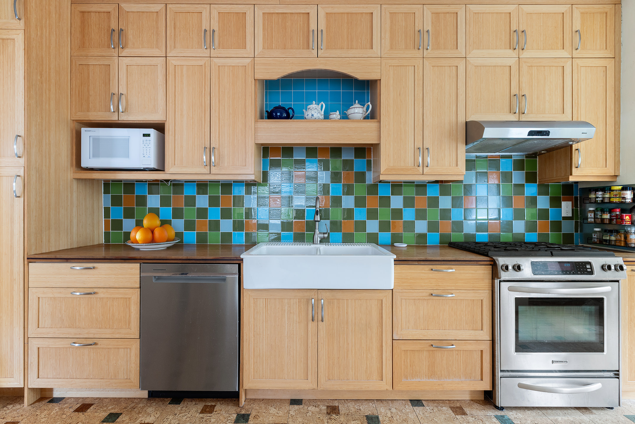 2536 Lurting Avenue Bronx, NY 10469 - Photo 7 of 27 a kitchen with stainless steel appliances granite countertop a stove and cabinets