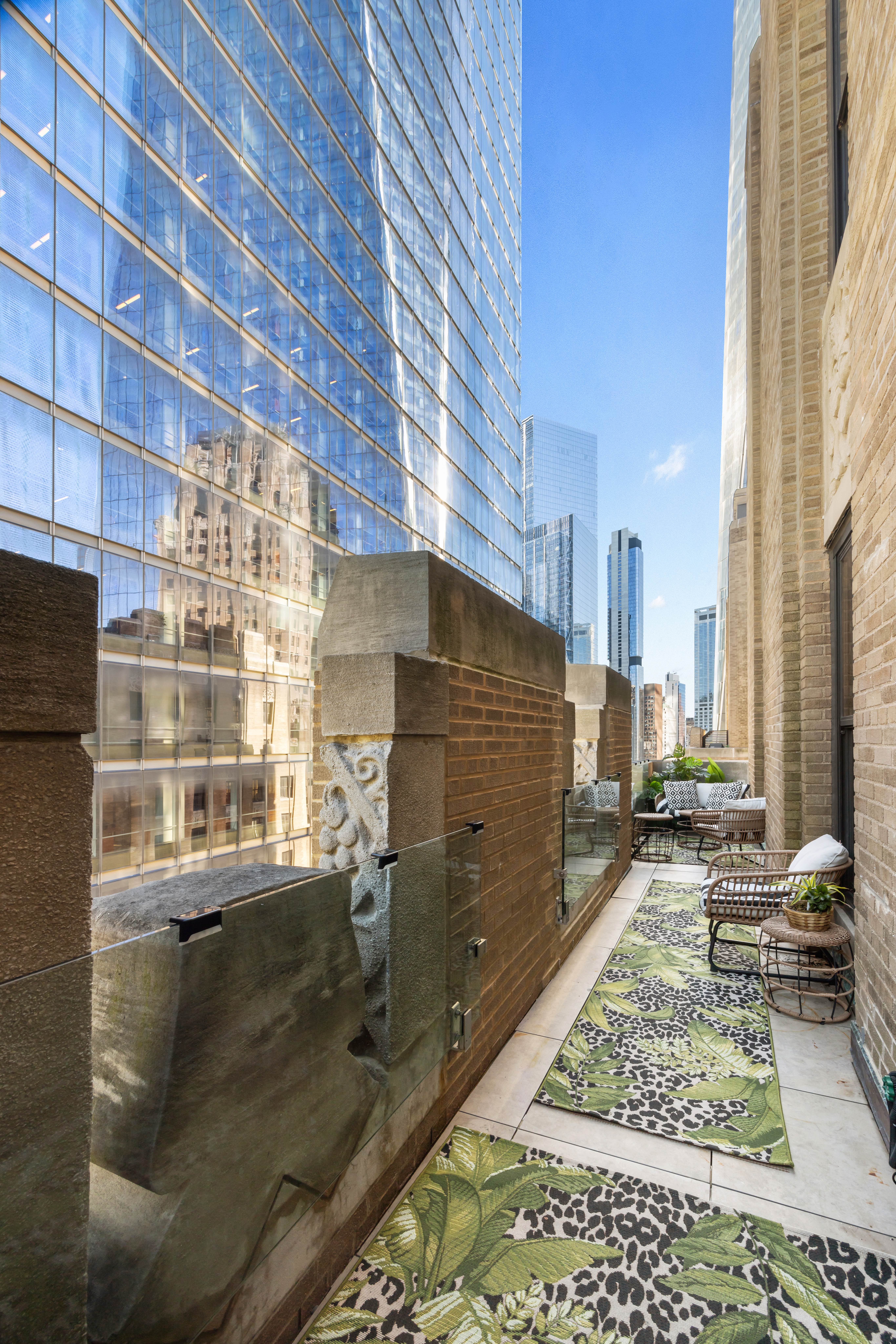 100 Barclay Street, Unit 16G Manhattan, NY 10007 - Photo 16 of 28 a view of a walk in the water