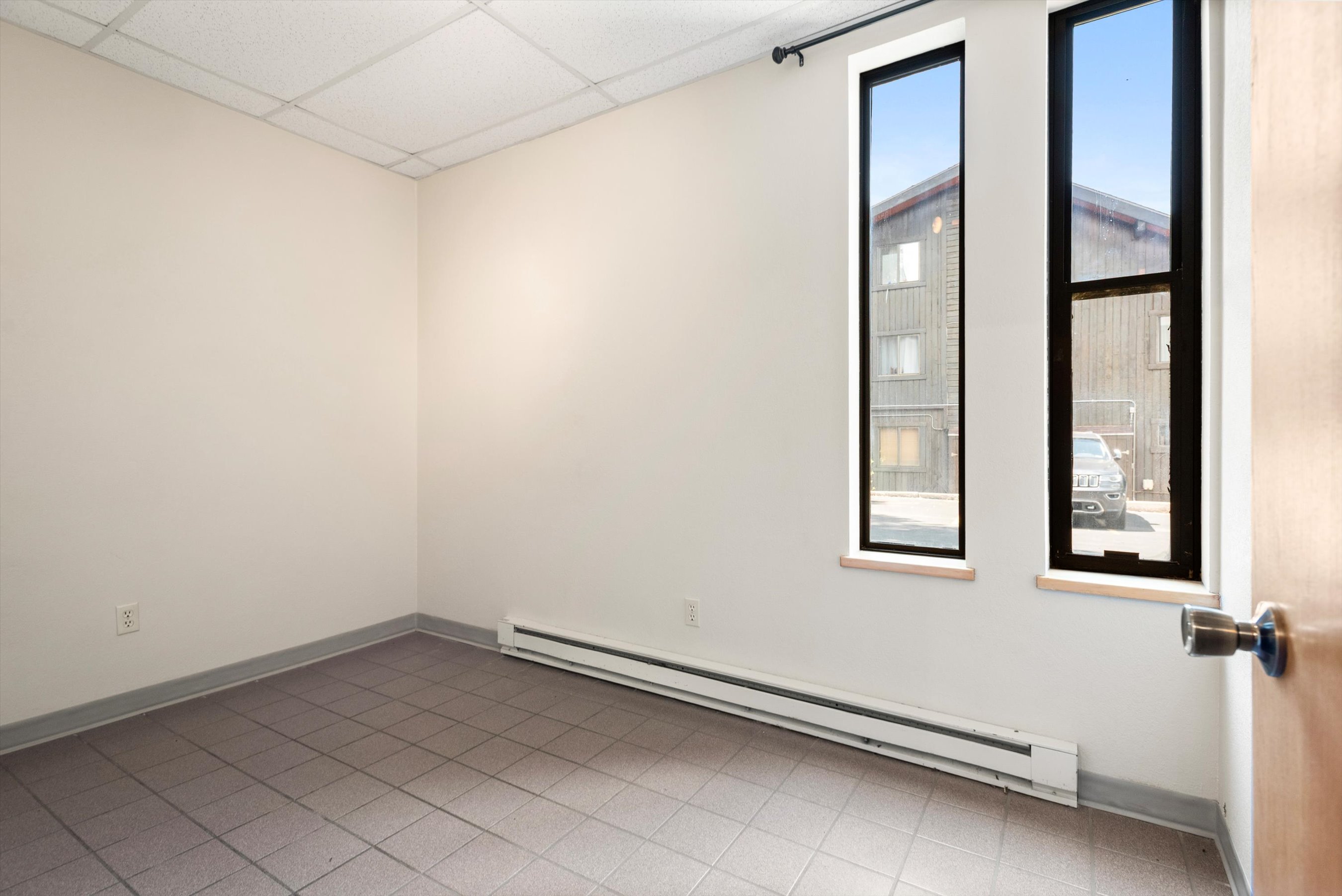 23286 Two Rivers Road, Unit 23 Basalt, CO 81621 - Photo 10 of 14 an empty room with windows