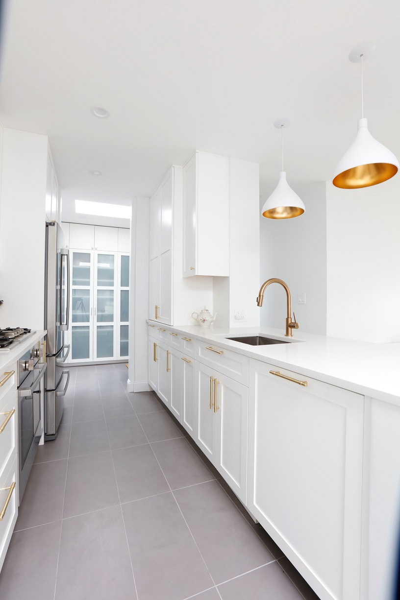 110 West 90th Street, Unit 5C Manhattan, NY 10024 - Photo 12 of 15 a large white kitchen with a window