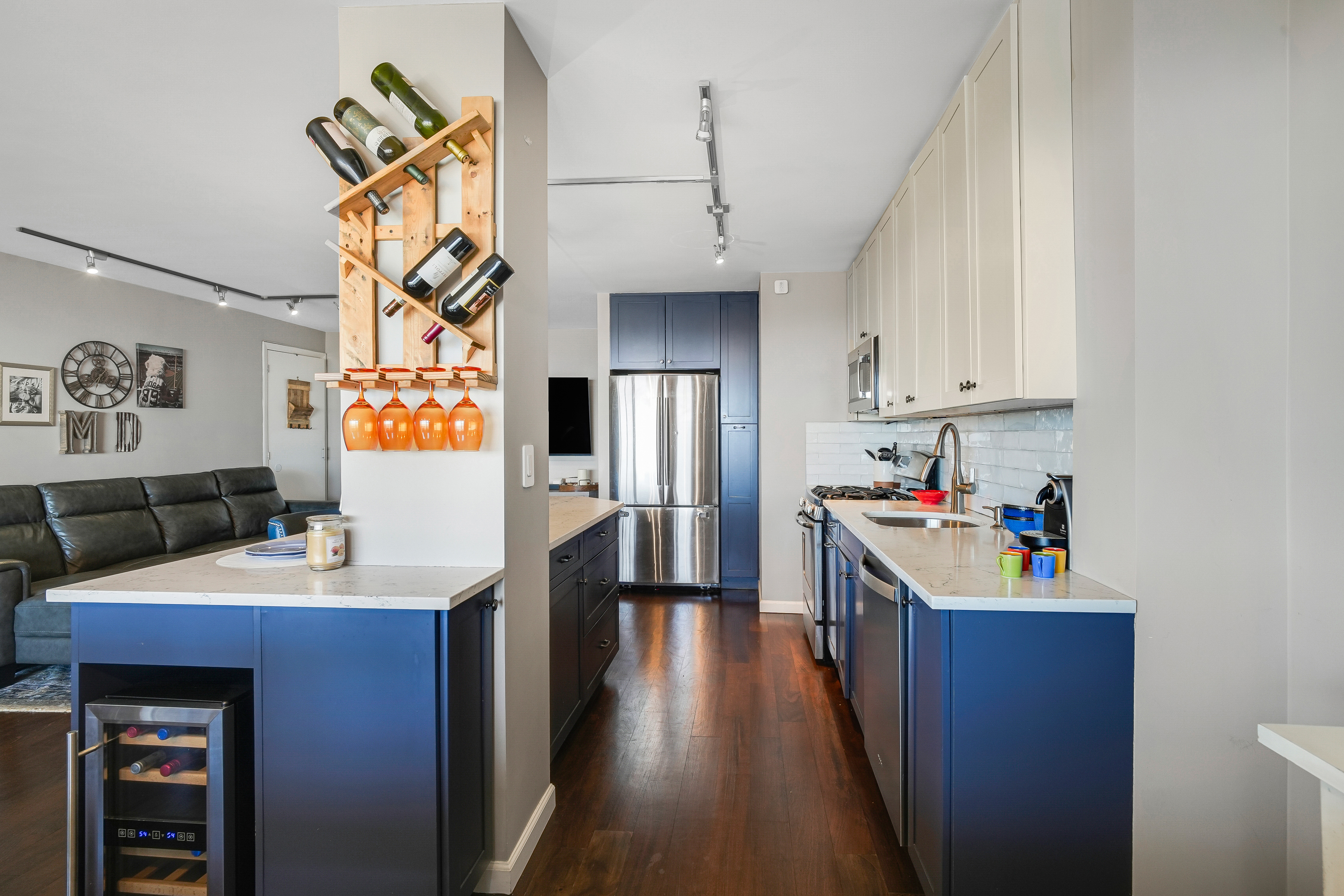 5900 Arlington Avenue, Unit 17W Bronx, NY 10471 - Photo 3 of 14 a kitchen with stainless steel appliances granite countertop a sink stove and refrigerator