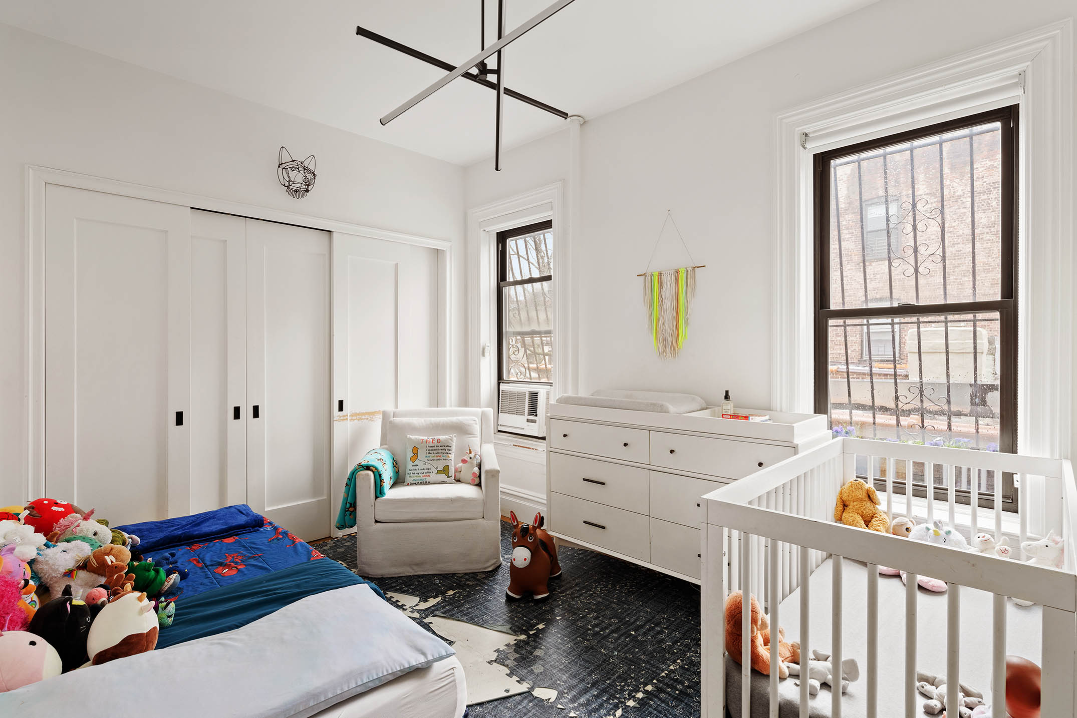 541 8th Street, Unit 3R Brooklyn, NY 11215 - Photo 7 of 9 a bedroom with furniture a bed and a window